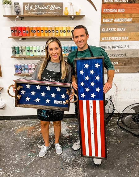 Couple with Patriotic Signs