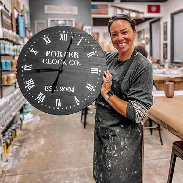 Customer holding Clock project